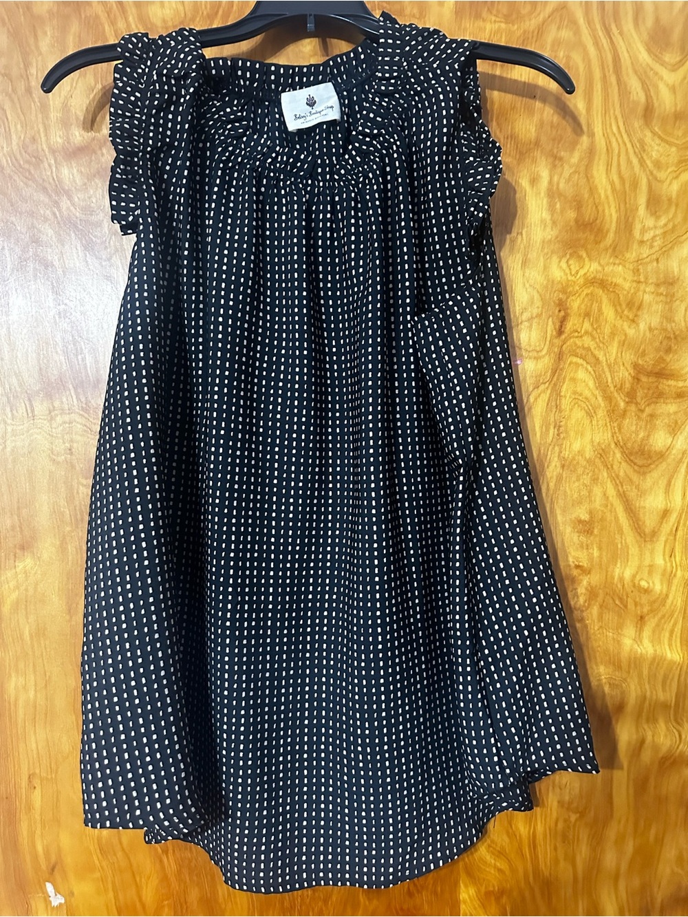 Like New Sleeveless Black Blouse with Tan Dot Print